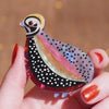 The Mysterious Montezuma Quail Brooch