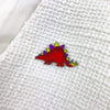 Scotty Stegosaurus Enamel Pin